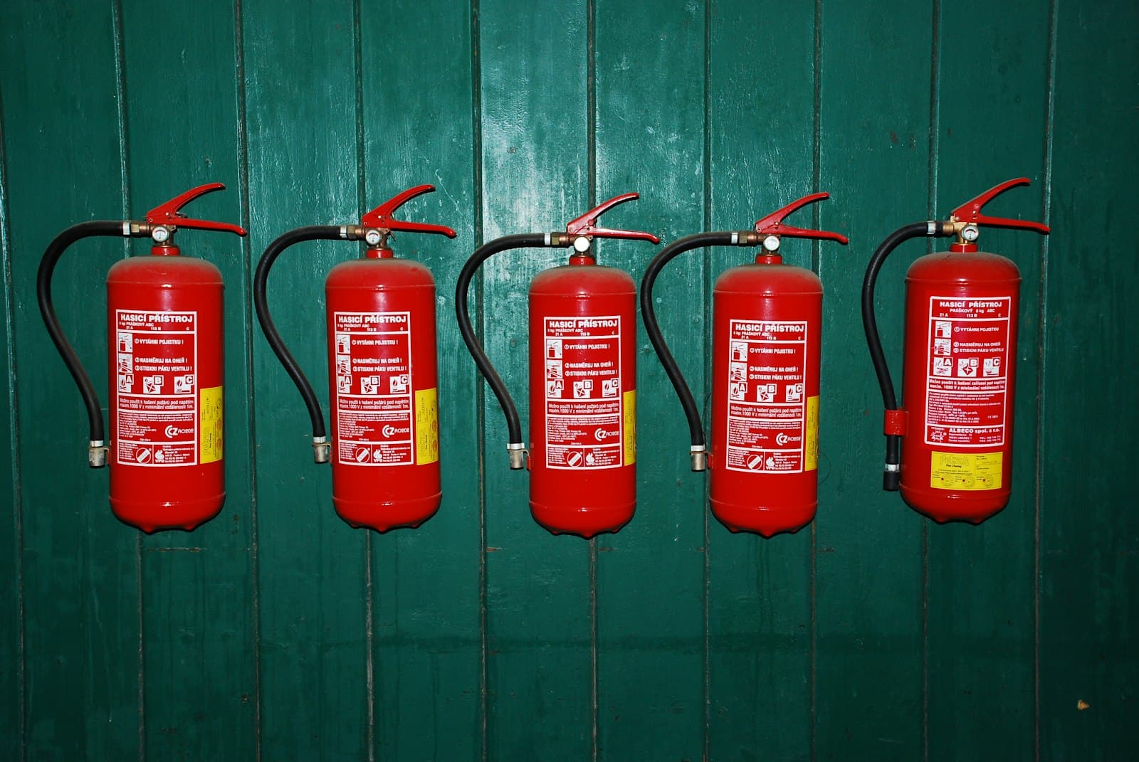 A row of fire extinguishers