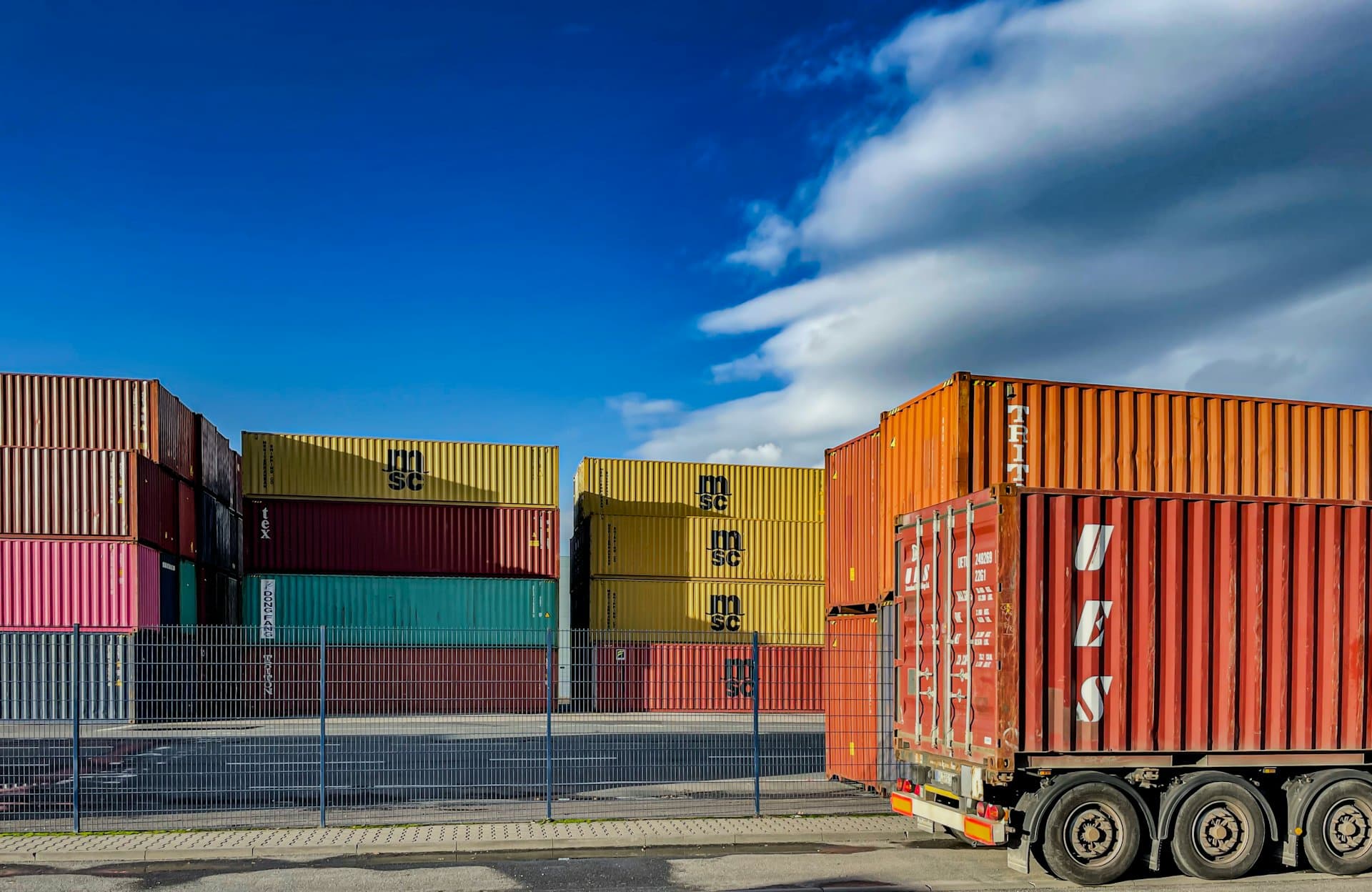 Export containers stacked at a port